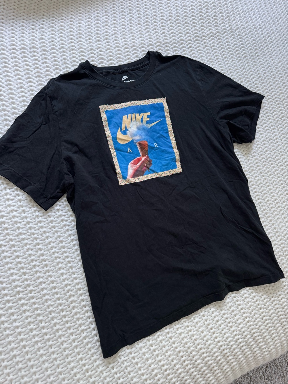 Nike Black Short Sleeve Tee with Blue & Gold Graphic